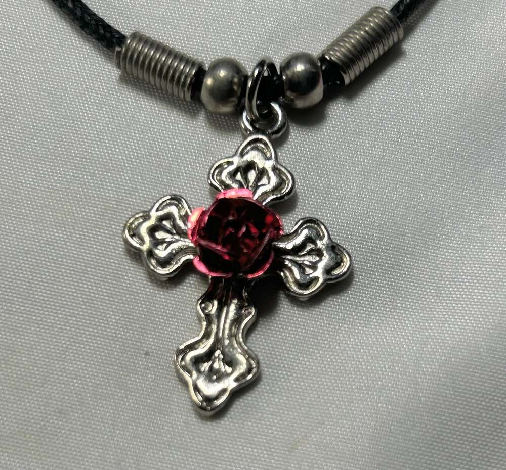 Cross necklace silver tone with red rose in center black cord lobster clasp